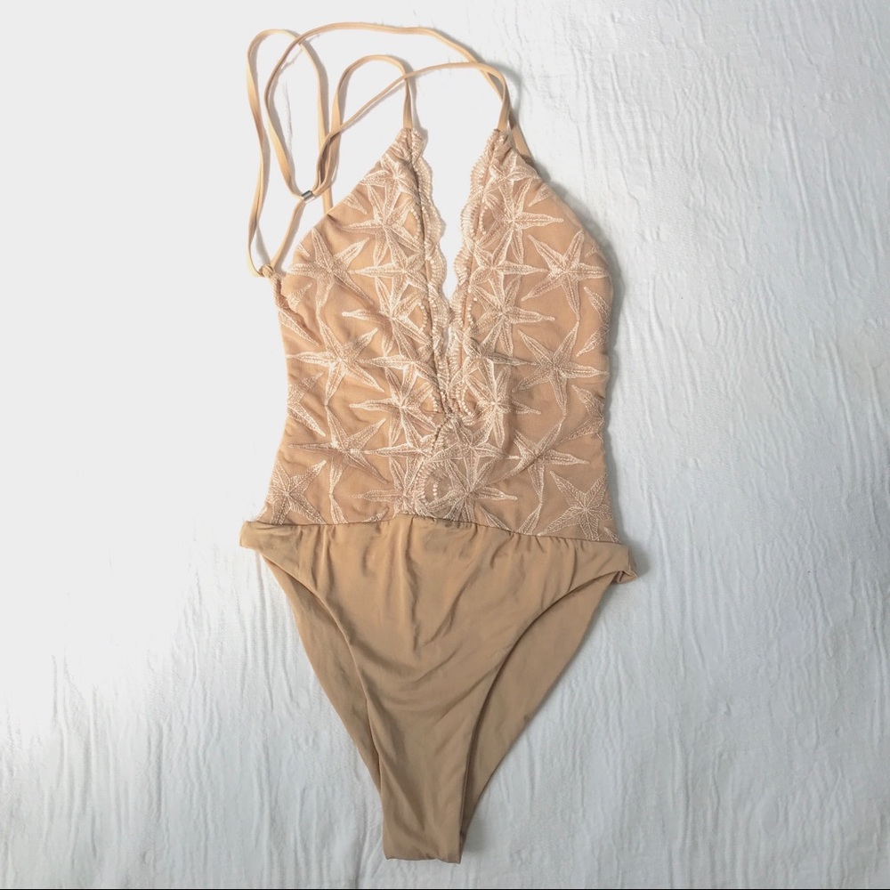 Blue Life tan lace one piece bathing suit